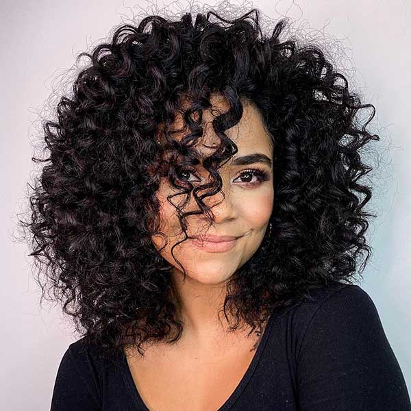 Medium Length Layered Curly Hair With Bangs
