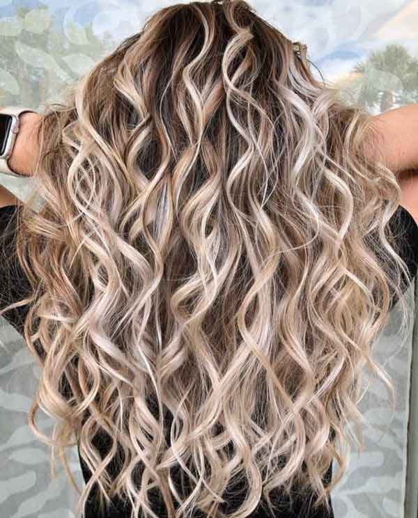 Long Curly Hair Blonde Highlights
