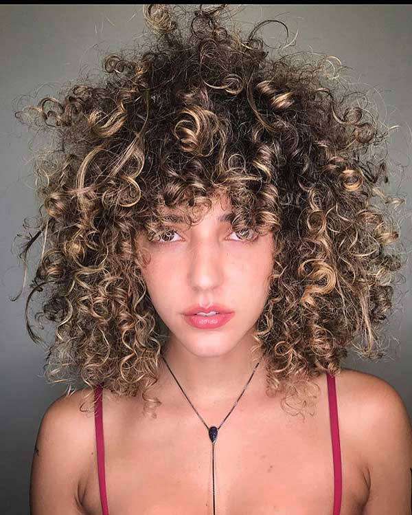 Medium Length Layered Curly Hair With Bangs